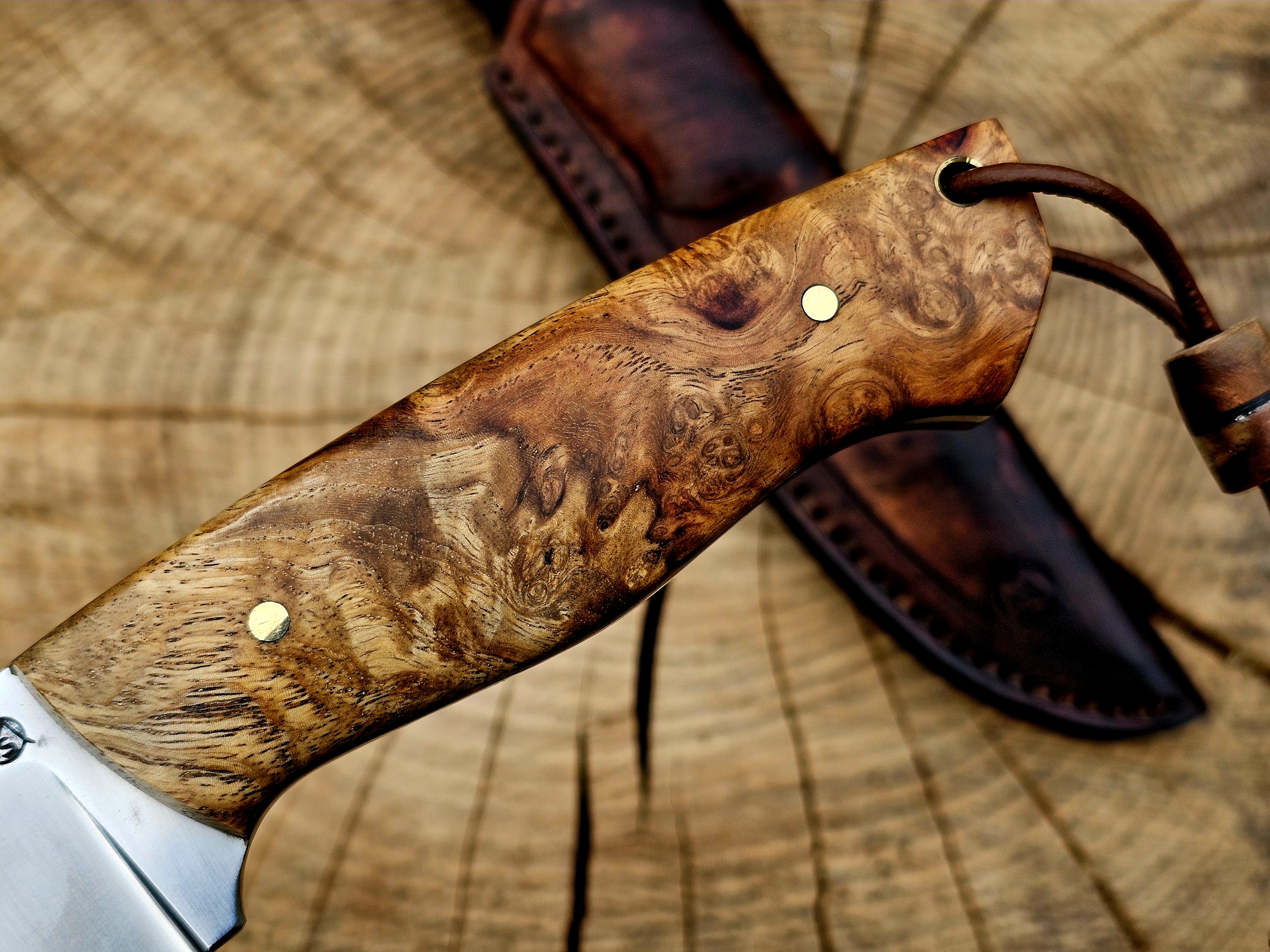 Griff aus stabilisierter Amboinamaser mit natürlicher Maserung Detailaufnahme